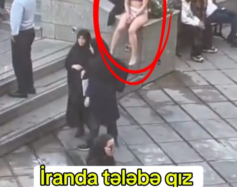 İranda tələbə qız məcburi hicaba etiraz   olaraq soyundu